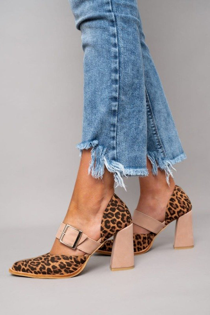 Animal print open toe heels displayed on a plain background.