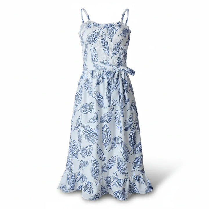 Casual sleeveless midi dress with adjustable straps on a plain background.