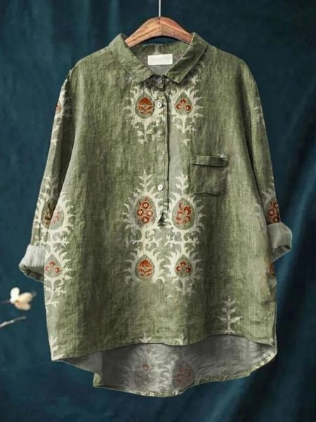 A printed blouse with graceful movement and lightweight styling.