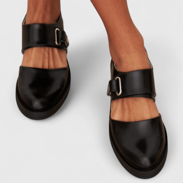 Classic women’s comfort shoes shown on a plain background with sleek detailing.
