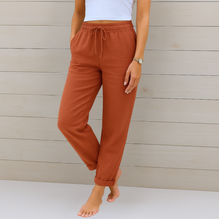 Female model showcasing breathable trousers designed for daily comfort and movement.