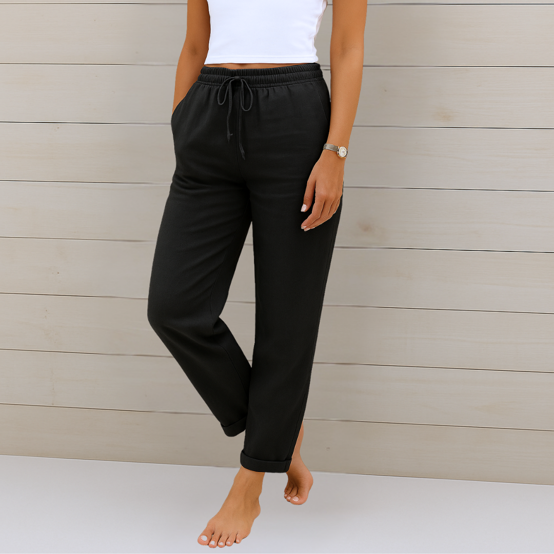 Female model in lightweight everyday trousers with a flattering straight-leg silhouette.