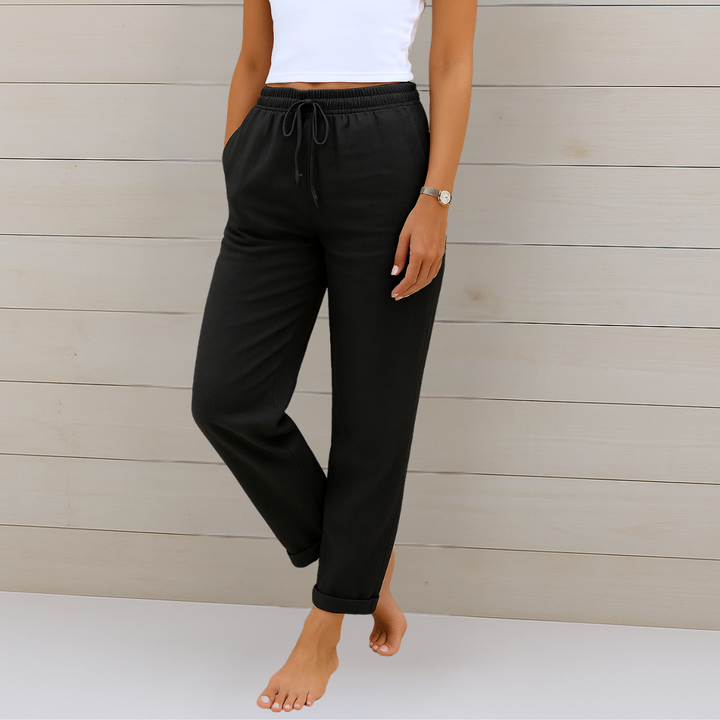 Female model in lightweight everyday trousers with a flattering straight-leg silhouette.
