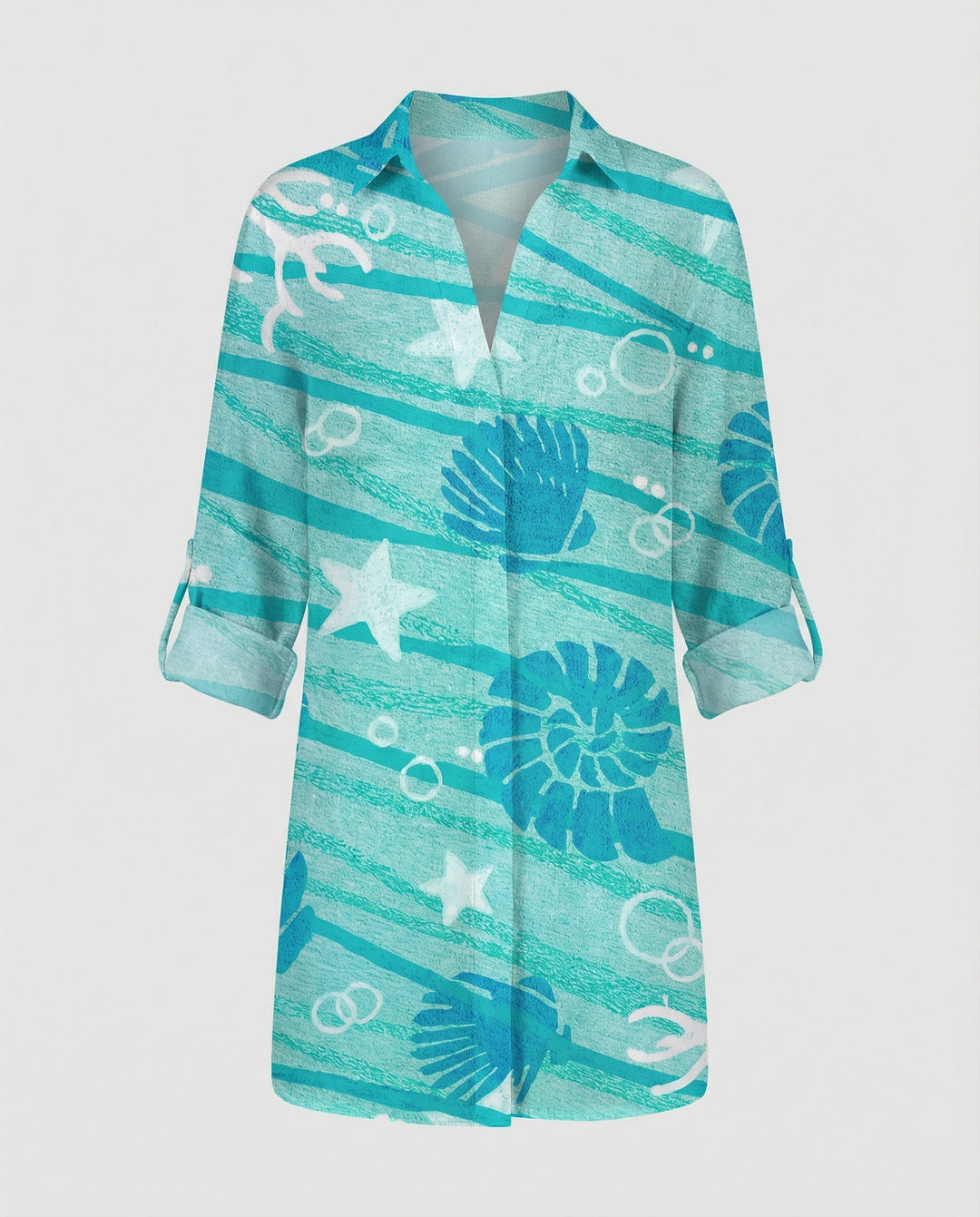 Loose-fit blouse with button placket and sea print.