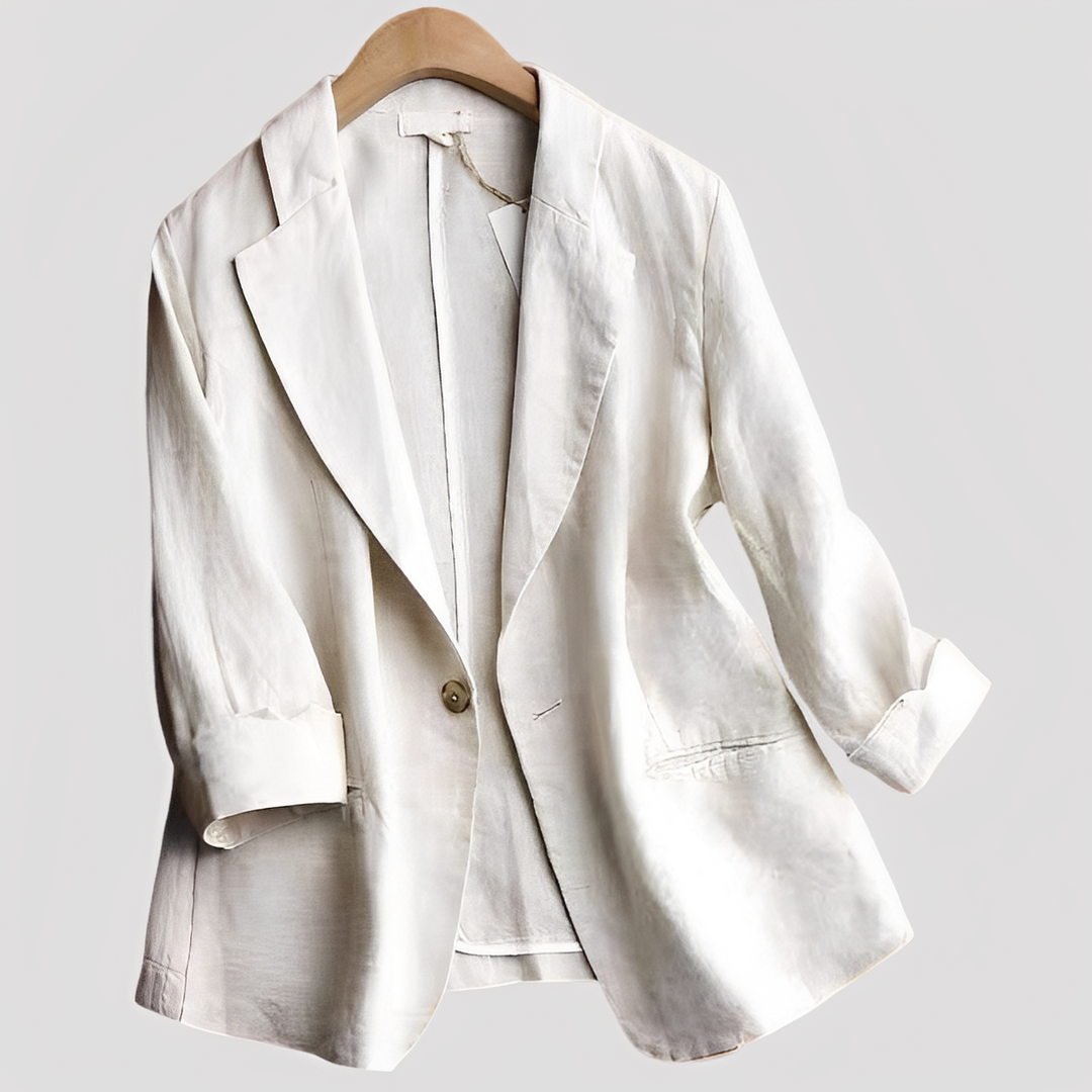 Female model wearing a lightweight 3/4 sleeve blazer against a plain background.

