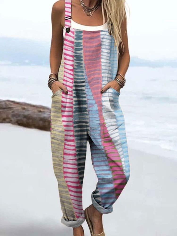 Female model wearing a relaxed wide-leg jumpsuit against a plain background.