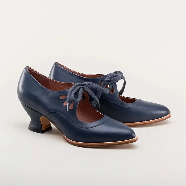 Vintage-inspired footwear with a plain background.