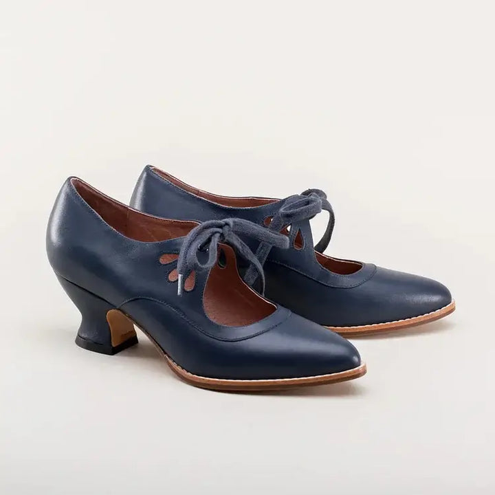 Vintage-inspired footwear with a plain background.