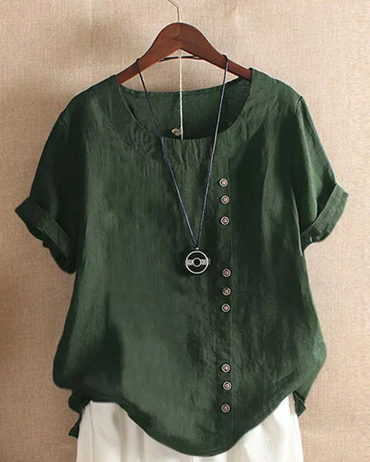  Woman modelling a lightweight everyday top with front button detail.