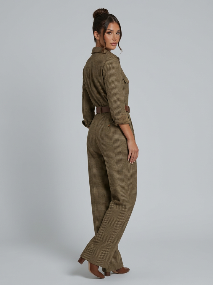 Woman posing in a polished check jumpsuit with a hidden back zippe