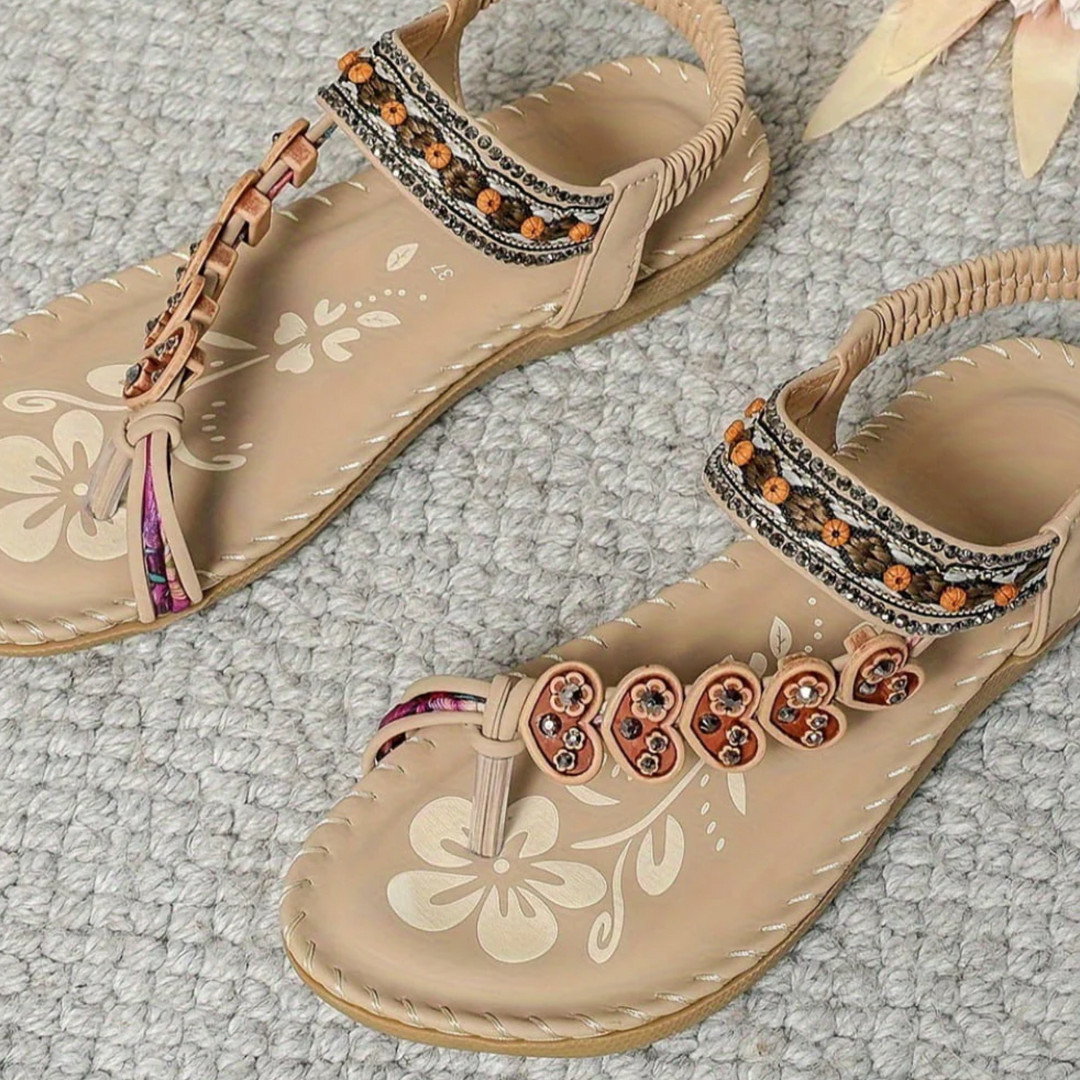 Lightweight sandals paired with a relaxed summer look.
