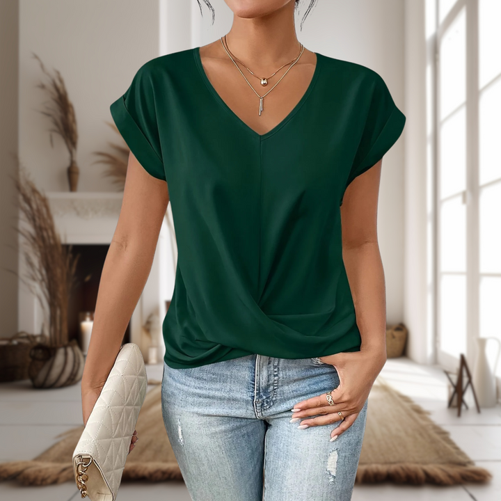  Woman wearing a sweetheart neck top styled for daily wear.