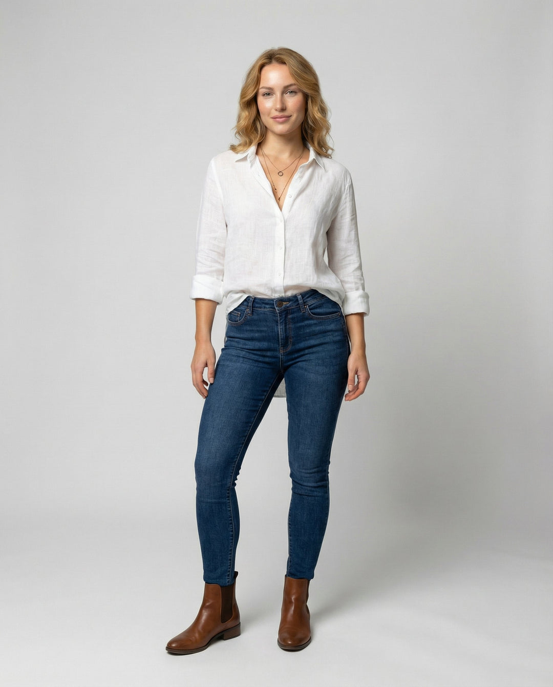 Female modelling a comfortable V-neck blouse with long sleeves.