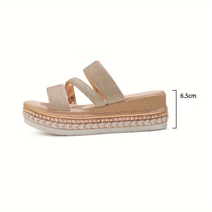 Open sandals with supportive sole and sparkling strap detail.