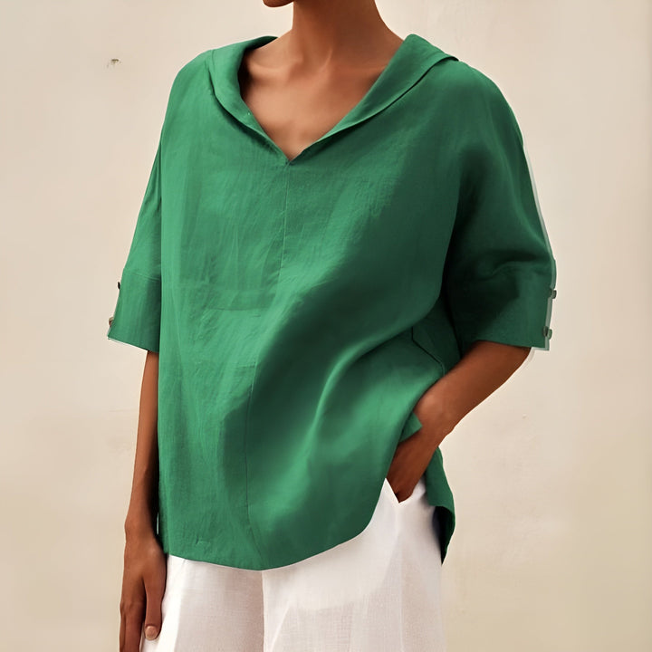 Female wearing a casual blouse with a timeless everyday design.