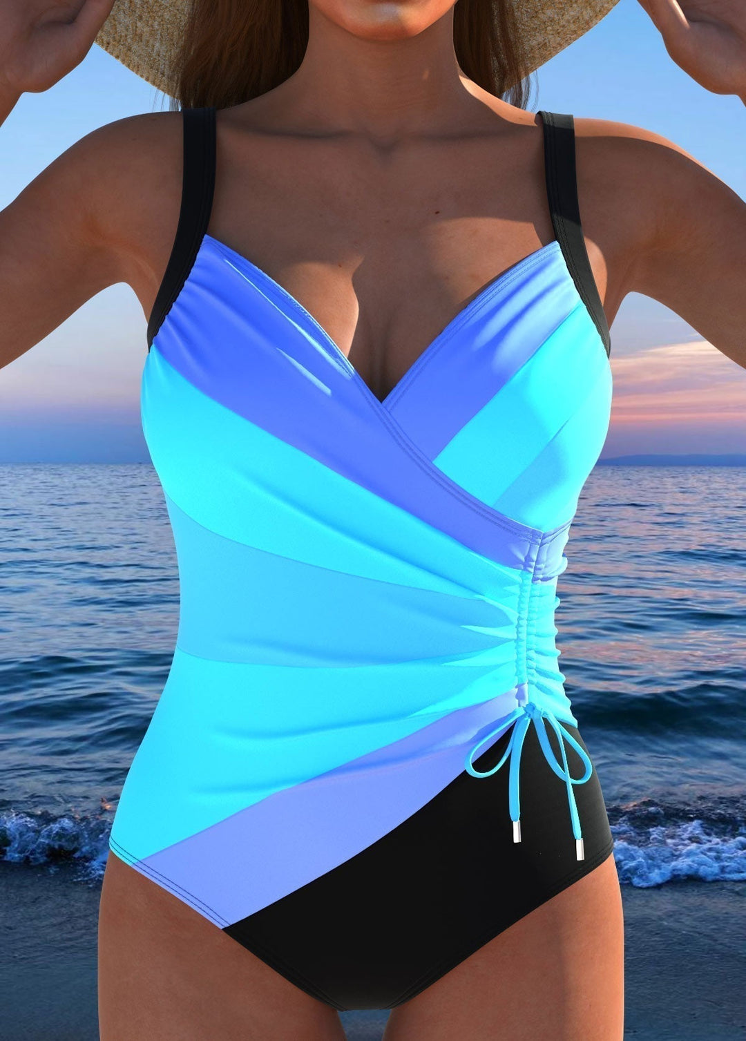 Woman showcasing a colorful slimming swimsuit with supportive fit against a beach background.