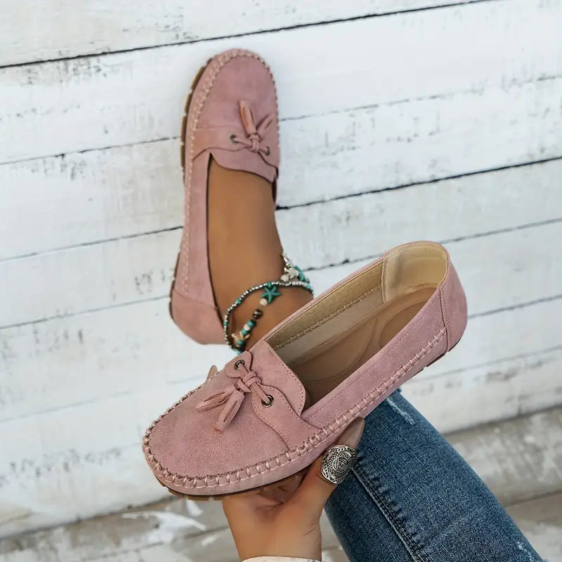 Smart casual women’s loafers displayed on a plain background.