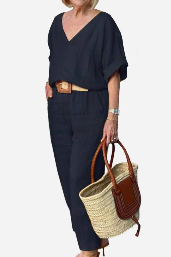  Woman in a two-piece outfit featuring a relaxed fit and streamlined trouser shape.
