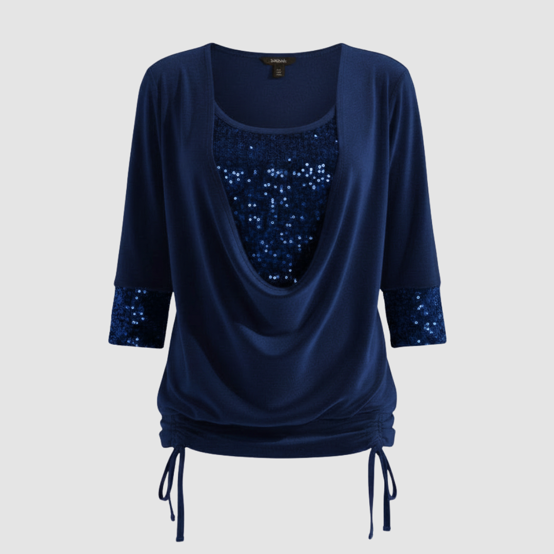Sequined blouse with a modern everyday look.