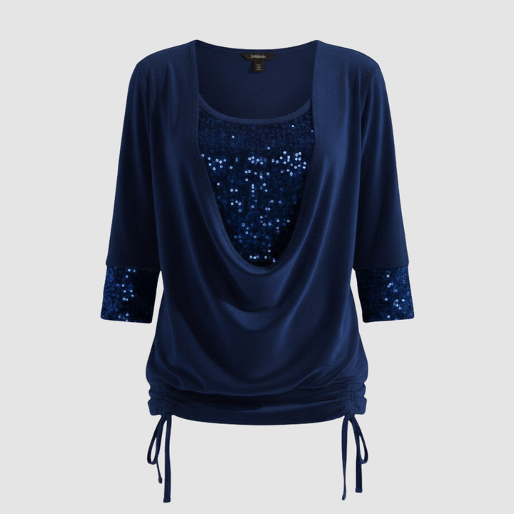Sequined blouse with a modern everyday look.