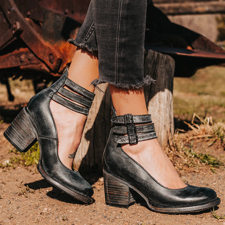 Female modelling casual fashion sandals with a modern silhouette.