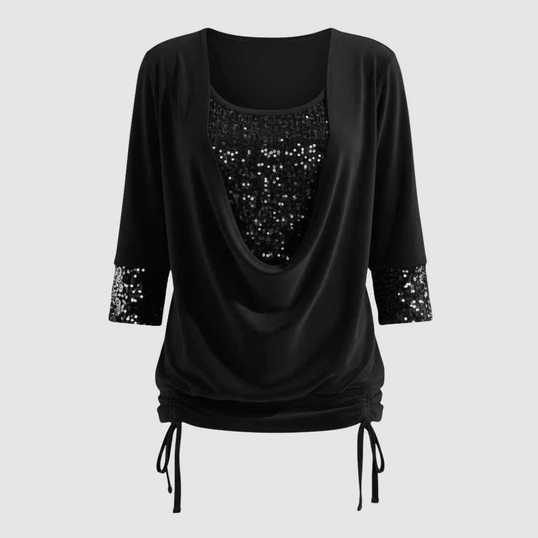 Casual shimmering blouse against a plain background.