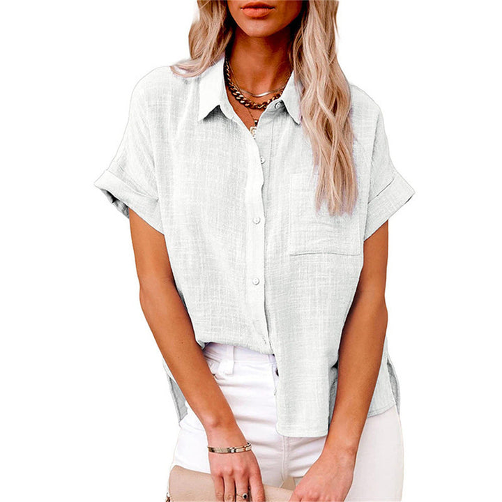  Model showcasing a lightweight striped blouse with a timeless pattern.