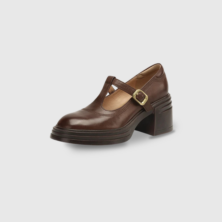 Stylish Mary Jane heels against a plain background.