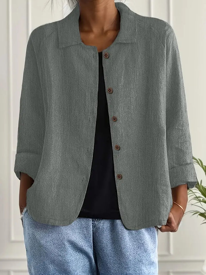  Woman modelling a versatile top suitable for changing weather.