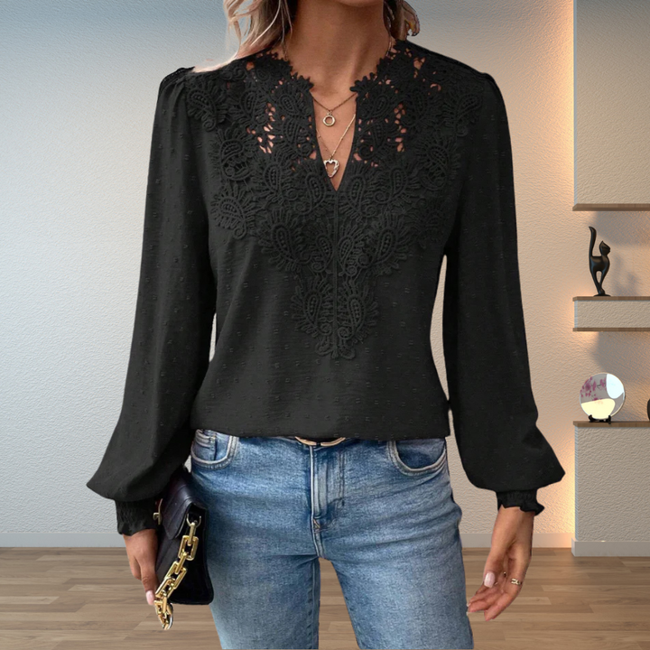  Woman modelling a lightweight blouse suitable for casual and smart styling.