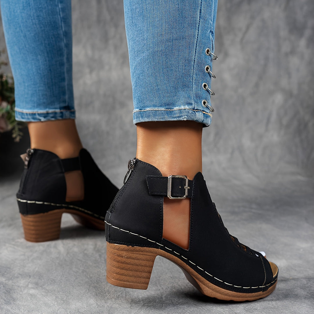 Female wearing supportive sandals with adjustable fastening and comfortable footbeds.