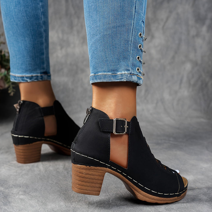 Female wearing supportive sandals with adjustable fastening and comfortable footbeds.