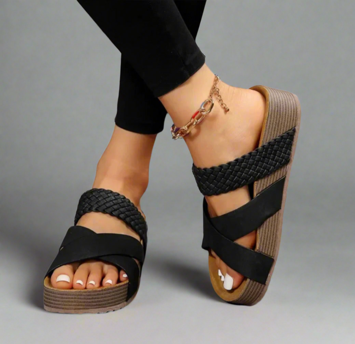 Woman in lightweight casual sandals designed for warm-weather wear.