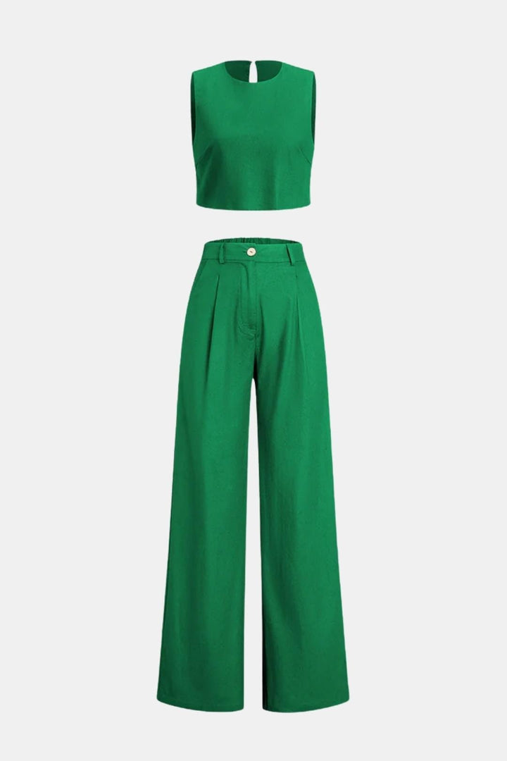 Model wearing a matching crop top and wide-leg trouser set on a plain background.