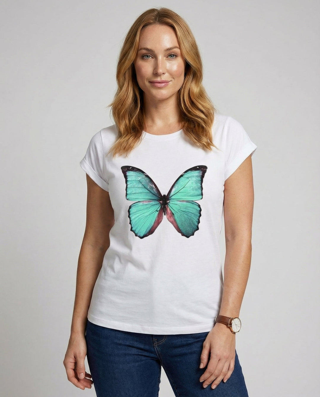 Woman wearing a lightweight summer T-shirt against a plain background.