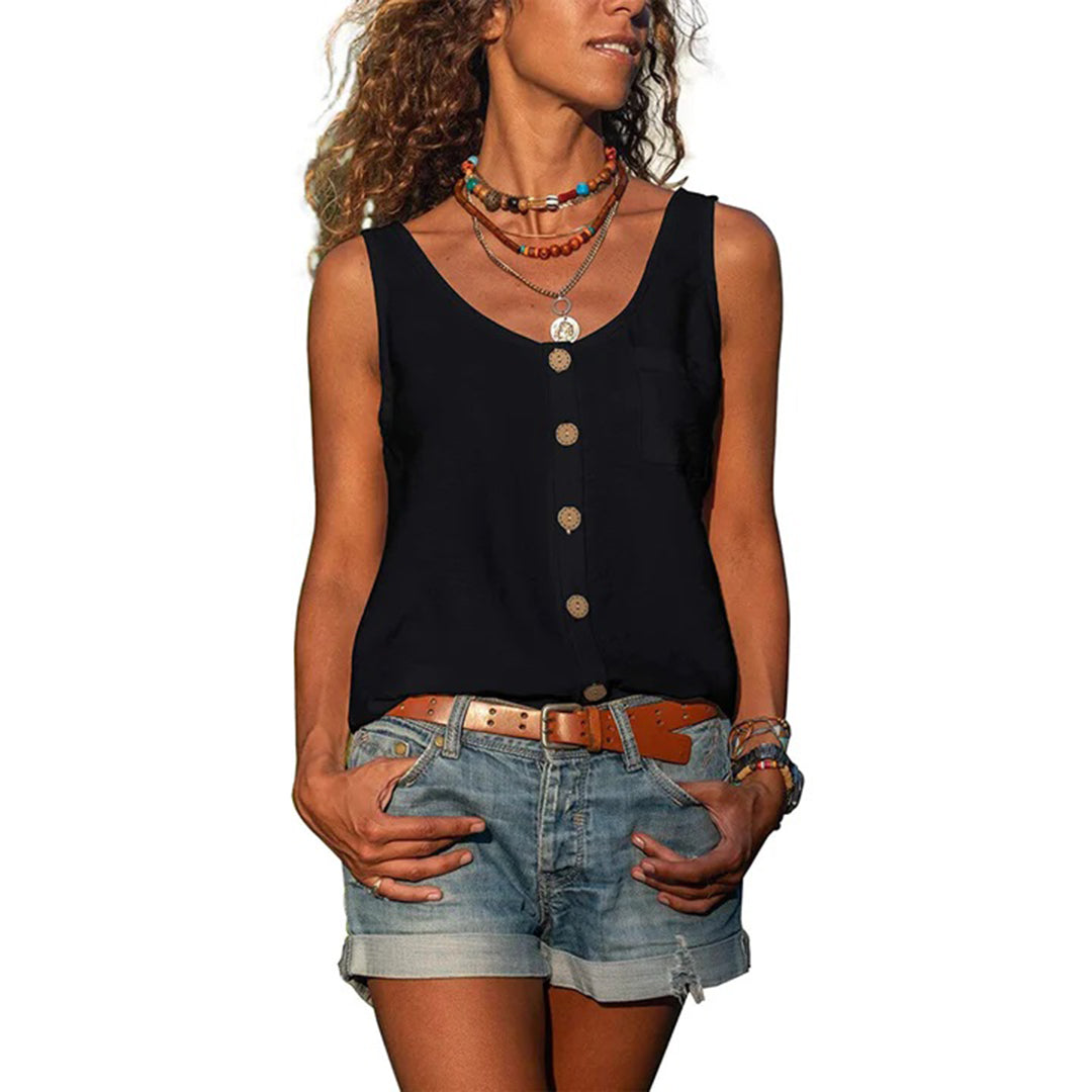  Woman wearing a loose sleeveless top paired with everyday styling.