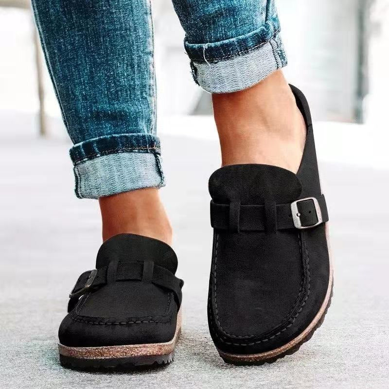 Female displaying lightweight casual loafers with simple slip-on fit on a plain background.