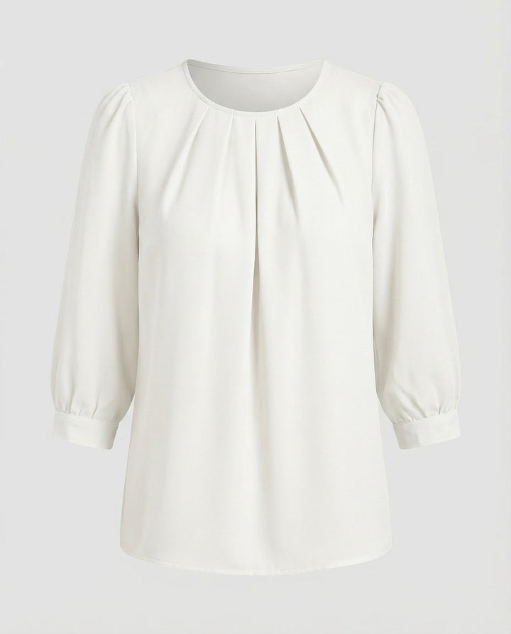 Long sleeve satin blouse with a subtle sheen.