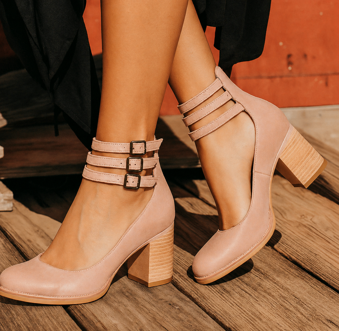 Woman modelling chic sandals with a clean and modern appearance.