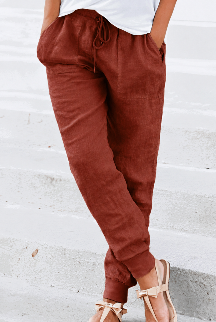 Woman wearing drawstring waist ankle pants suitable for daily wear and travel.