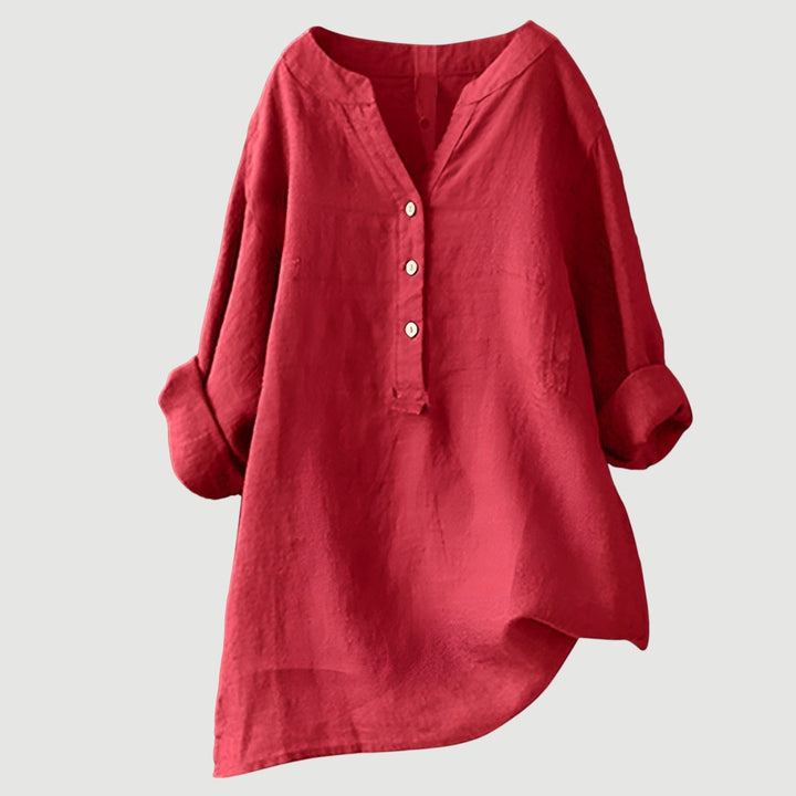 Breezy linen top against a plain background.