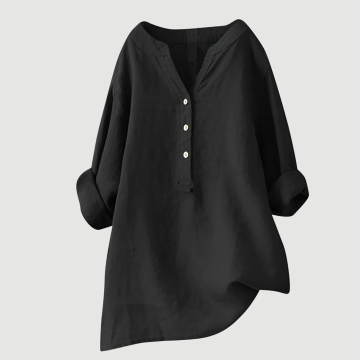 Loose-fit linen top shown on a plain background.