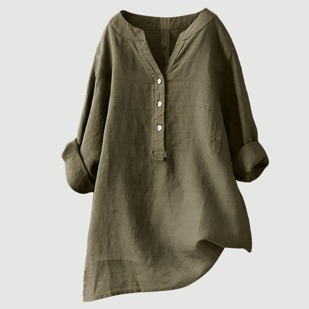 Casual short-sleeve linen top on a plain background.