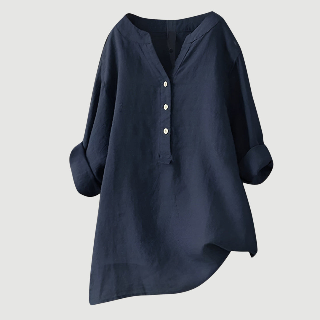 Breezy casual top against a plain backdrop.