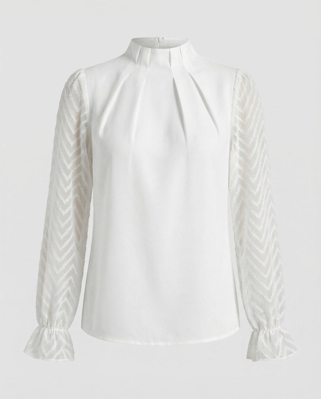 Modern long-sleeved top with a feminine shape.