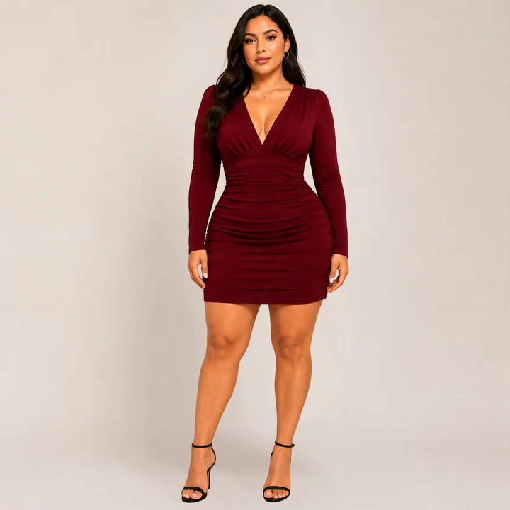 Female model showcasing a deep neckline bodycon dress with a sleek mini silhouette on a plain background.