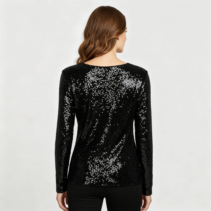 Sparkling V-neck top with elegant party styling.