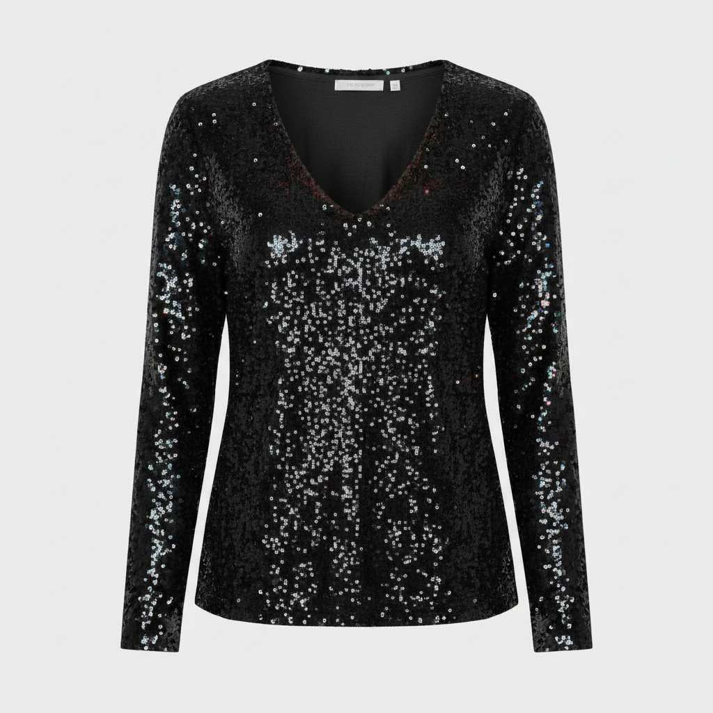 Shimmering V-neck evening top on a plain background.
