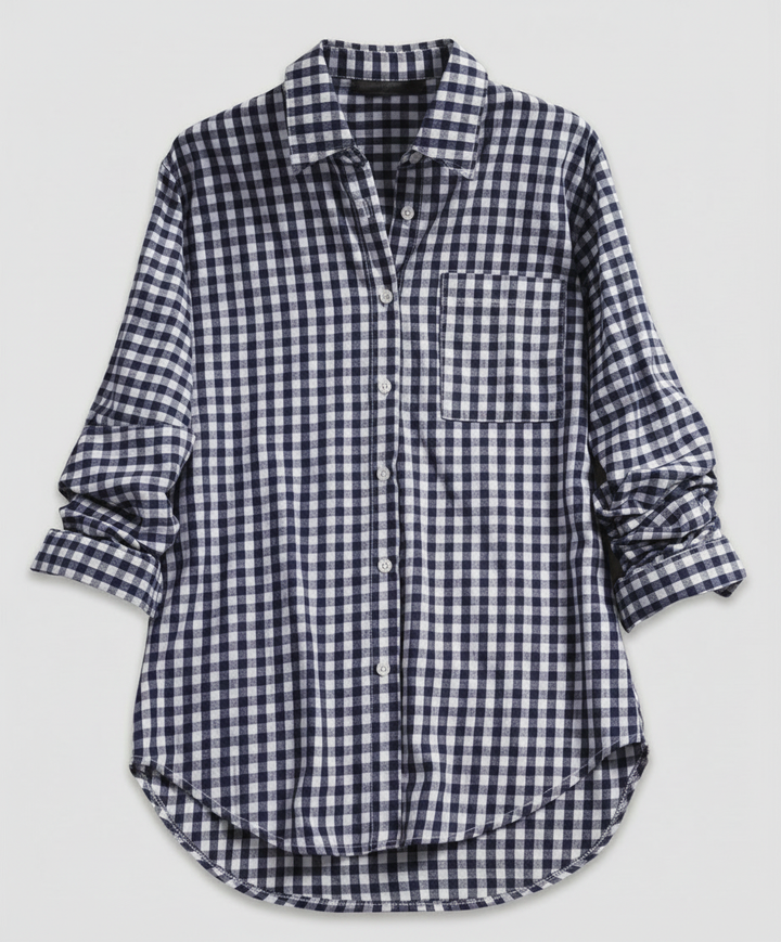 Oversized check blouse styled for everyday wear.