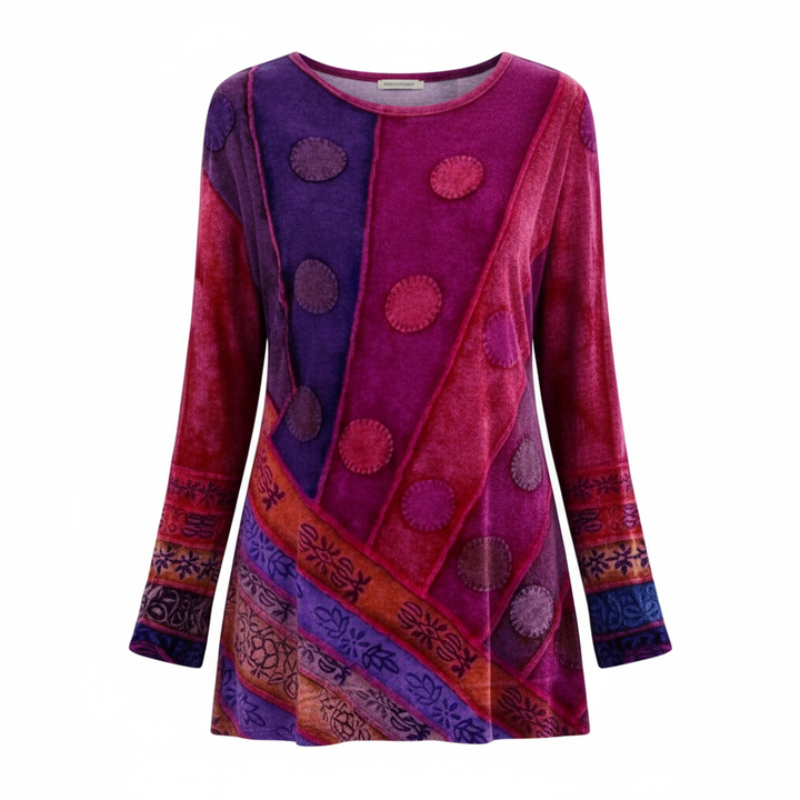 Relaxed tunic top with round neckline on a plain background.